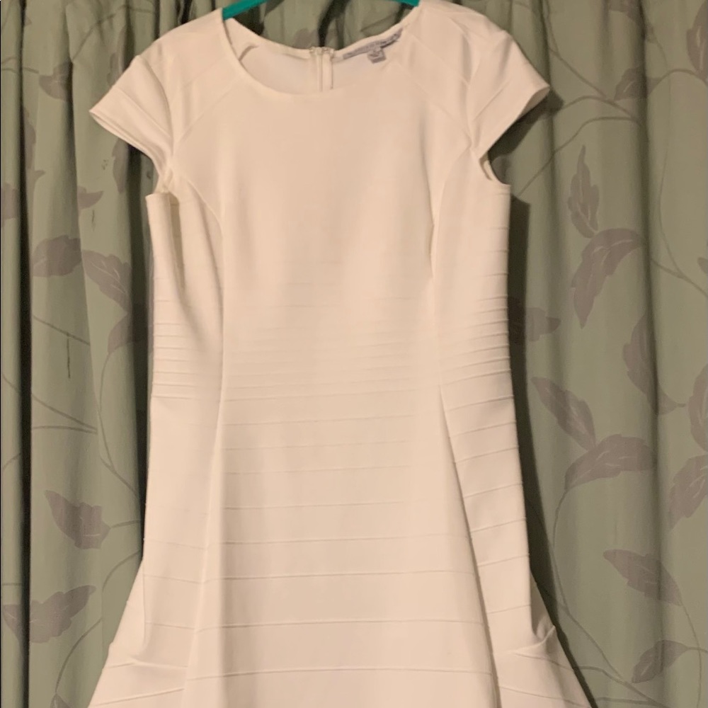 Crisp white 1 piece zipper back dress